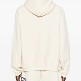 White hoodies worn by a person, showing the hoodies fit