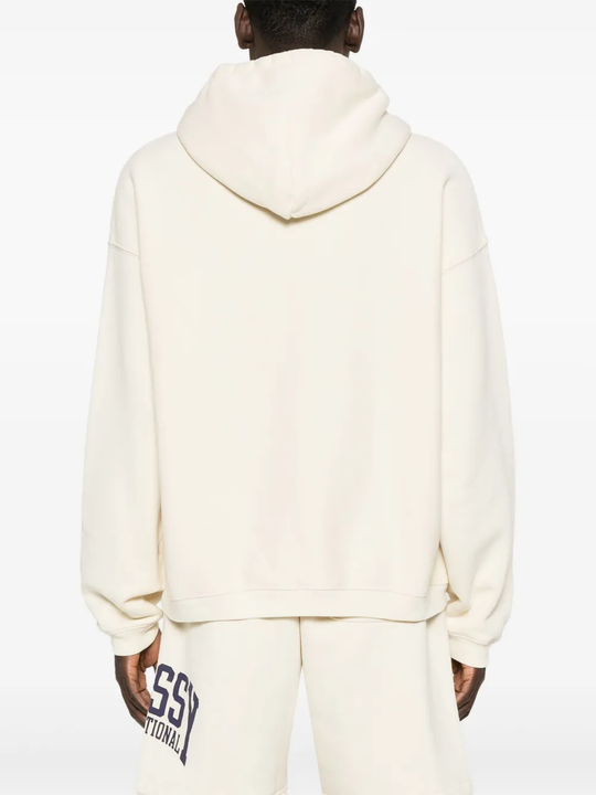 White hoodies worn by a person, showing the hoodies fit