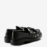 Black loafer, back view