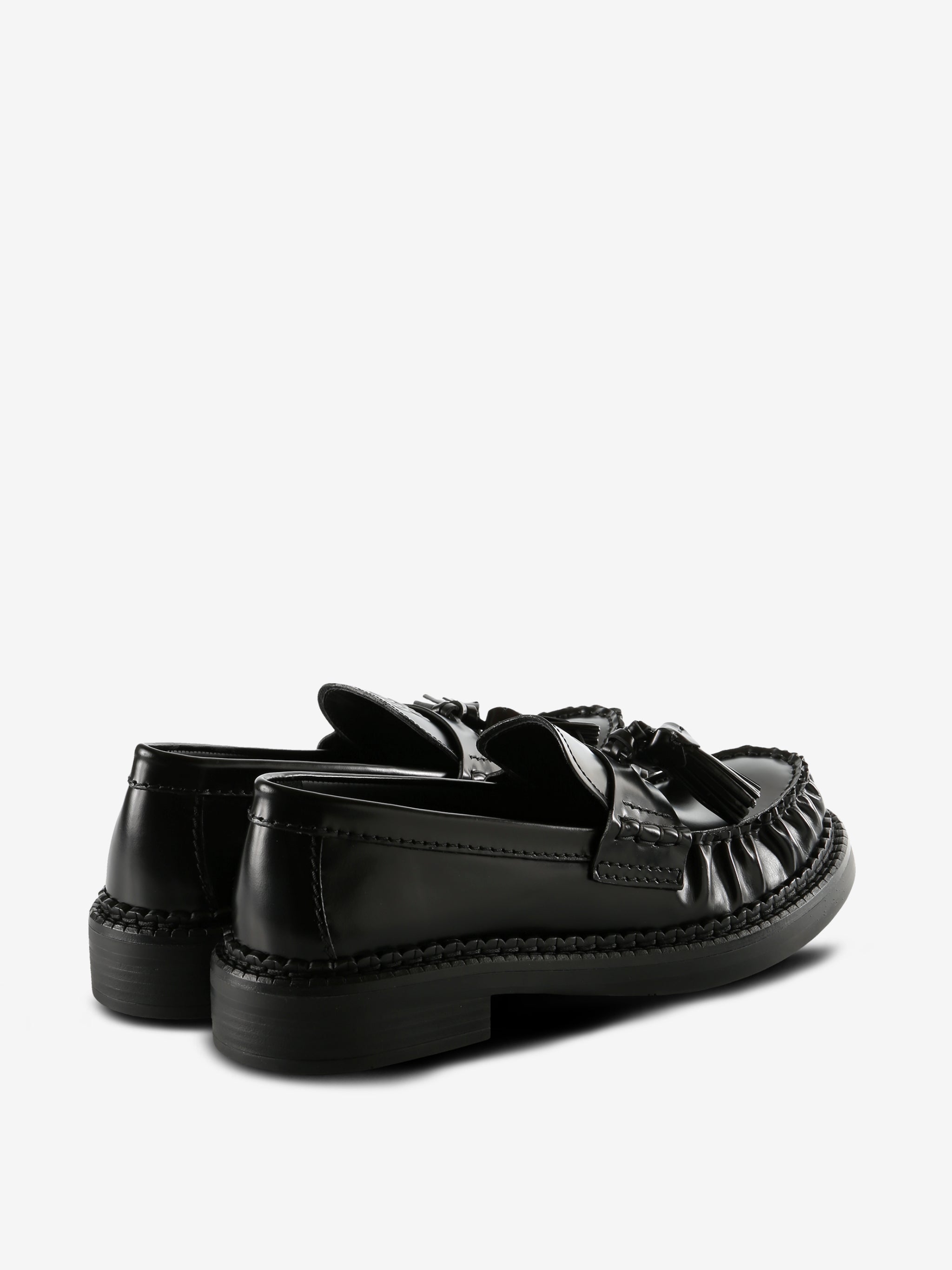 Black loafer, back view