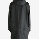 Black jackets worn by a person, showing the jacket’s fit