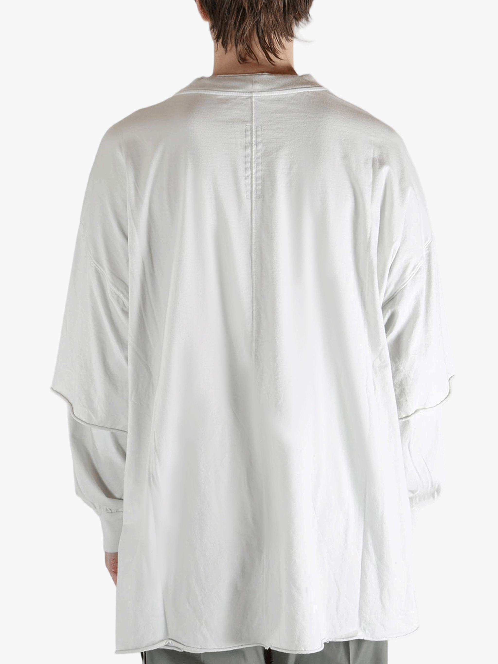 White sweats worn by a person, showing the sweats fit