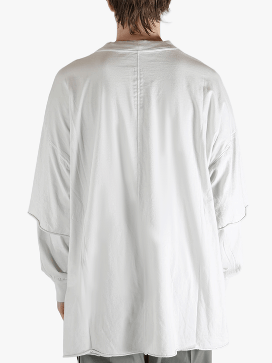 White sweats worn by a person, showing the sweats fit