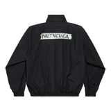 Black jacket, back view