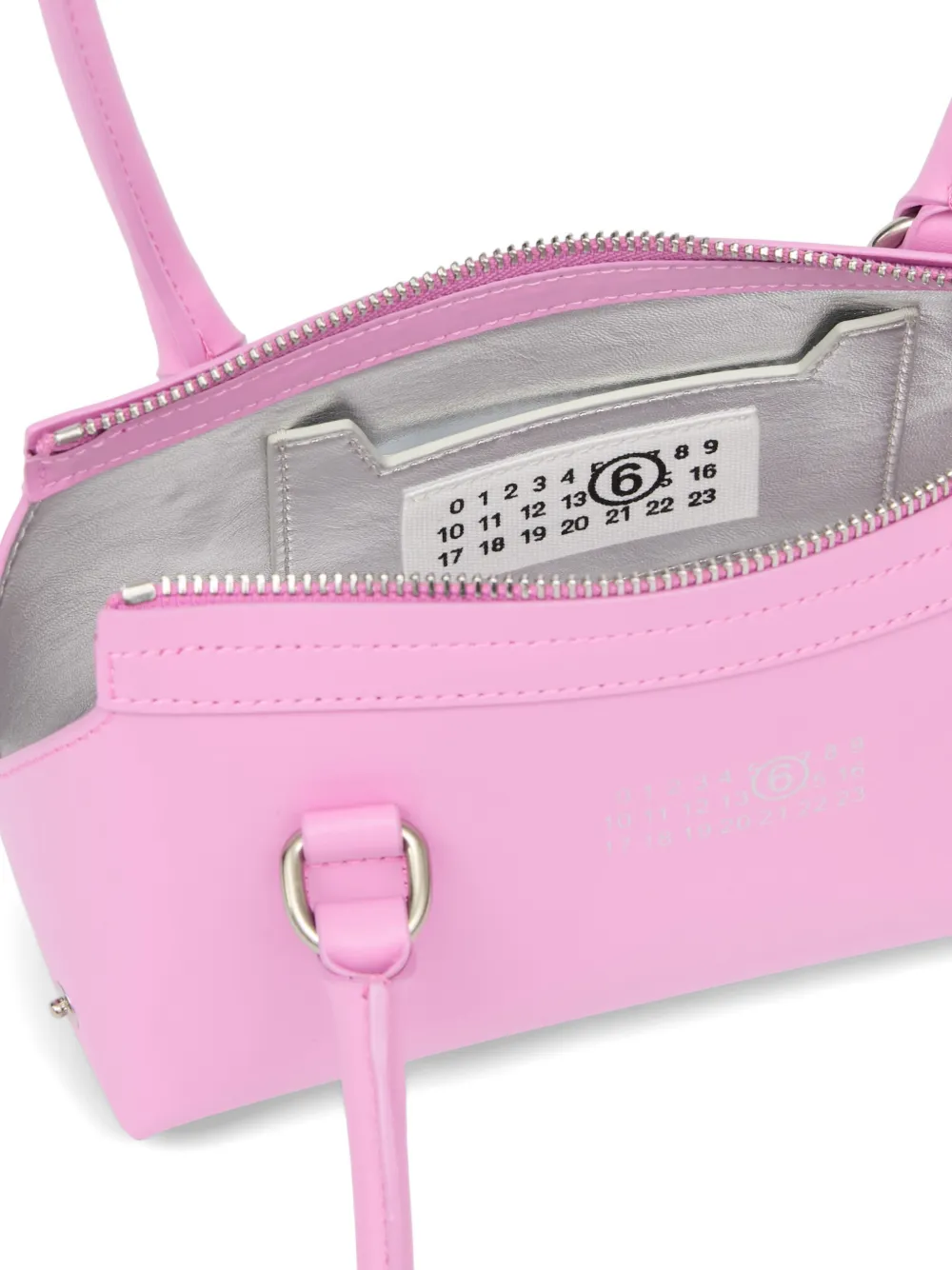 Close up of Pink bags, showing texture of the calf leather fabric