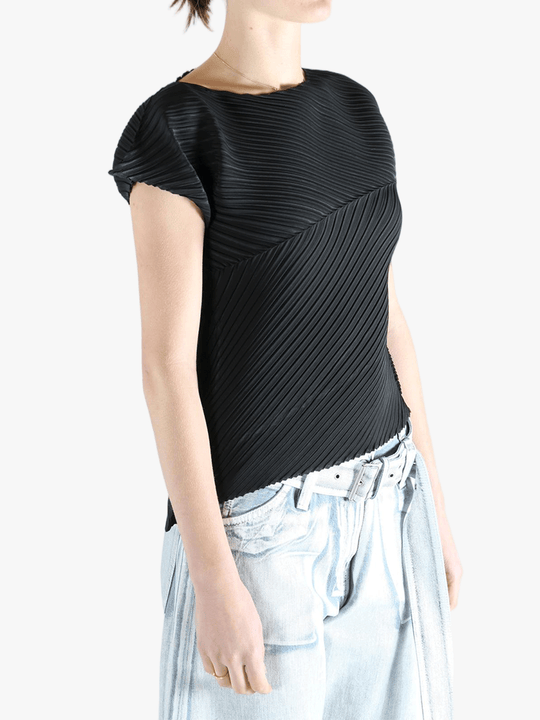 Black shirt worn by a person, showing the shirt's fit