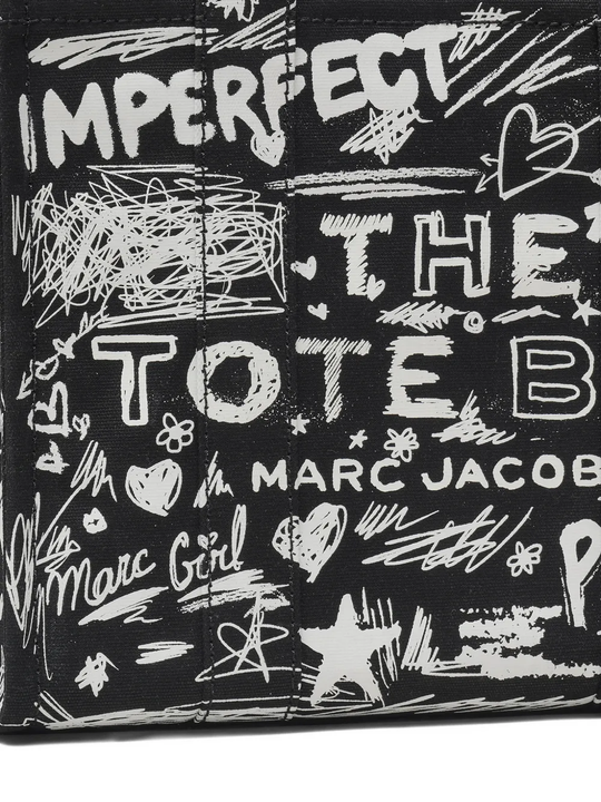 Close up of black bag, showing texture of the cotton fabric