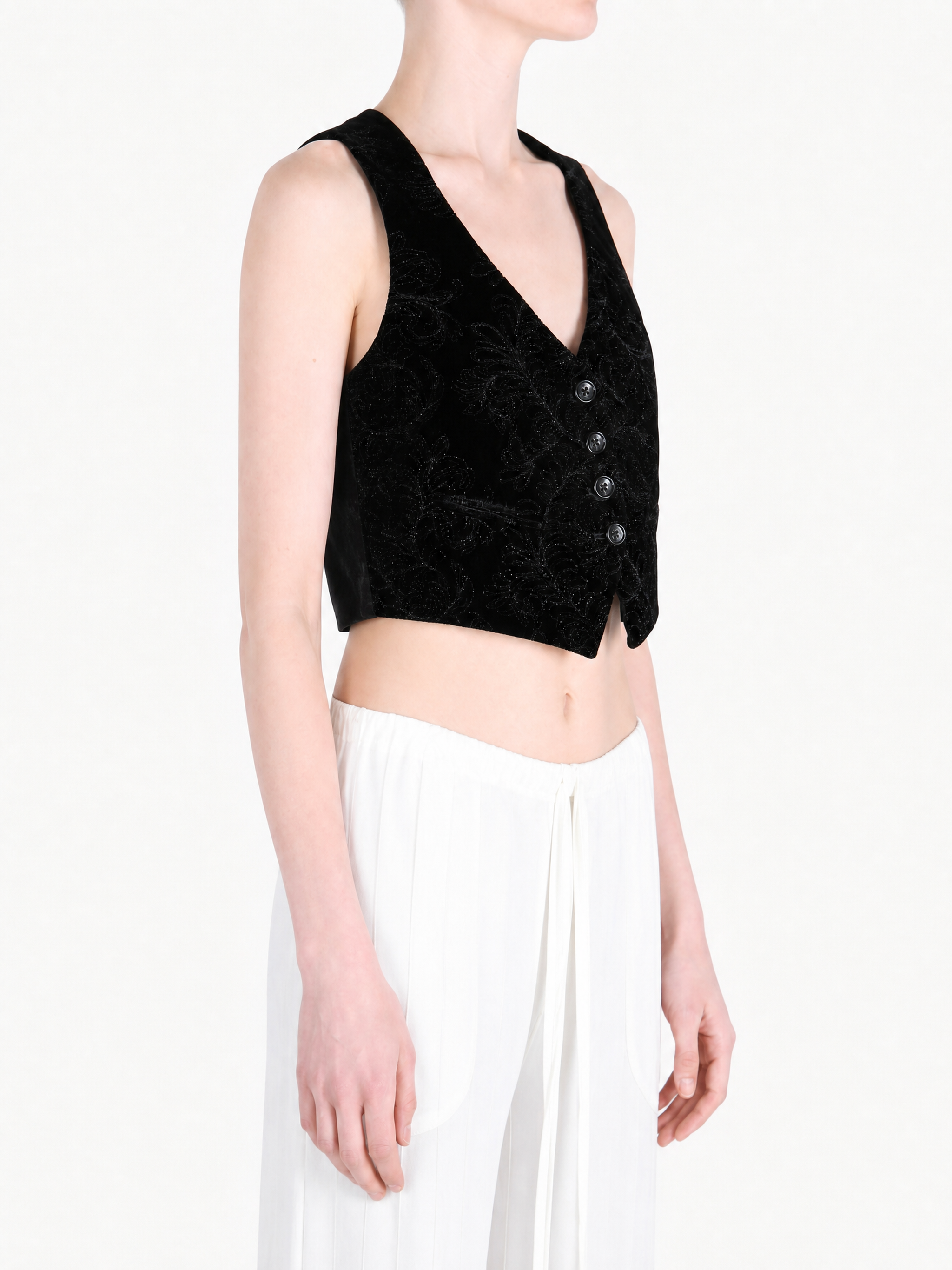 Black jacket worn by a person, showing the jacket fit