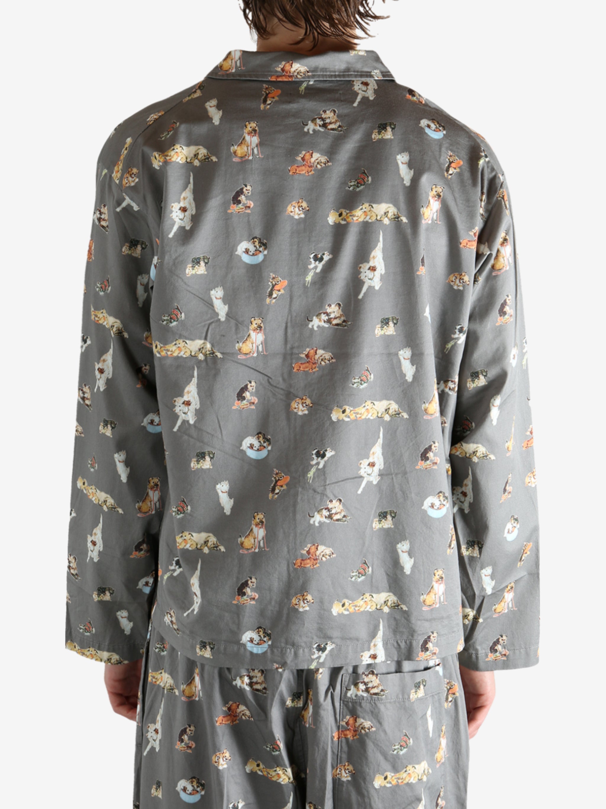 Grey pajama worn by a person, showing the pajama's fit