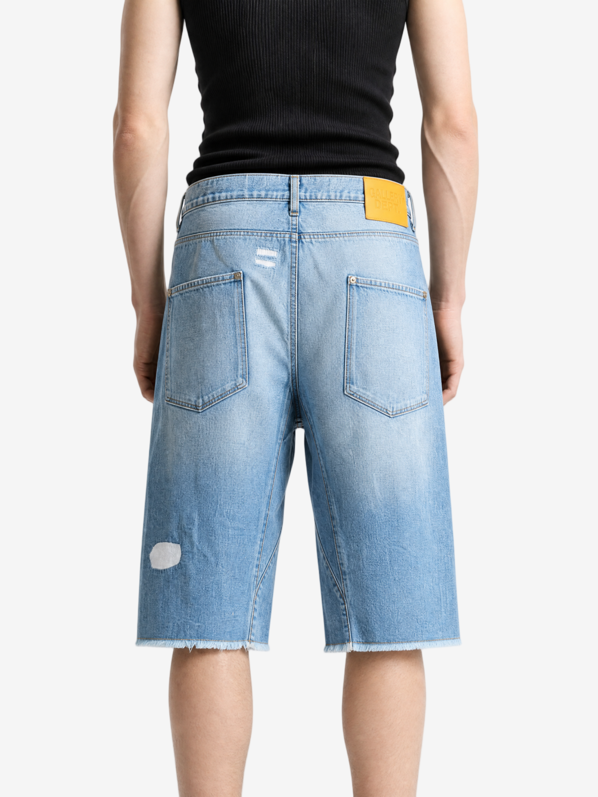 Blue shorts worn by a person, showing the shorts fit