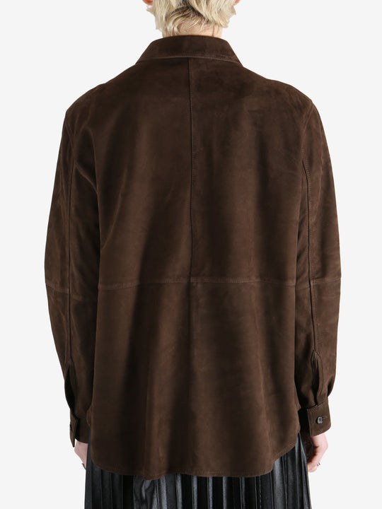 Brown shirts worn by a person, showing the shirts fit