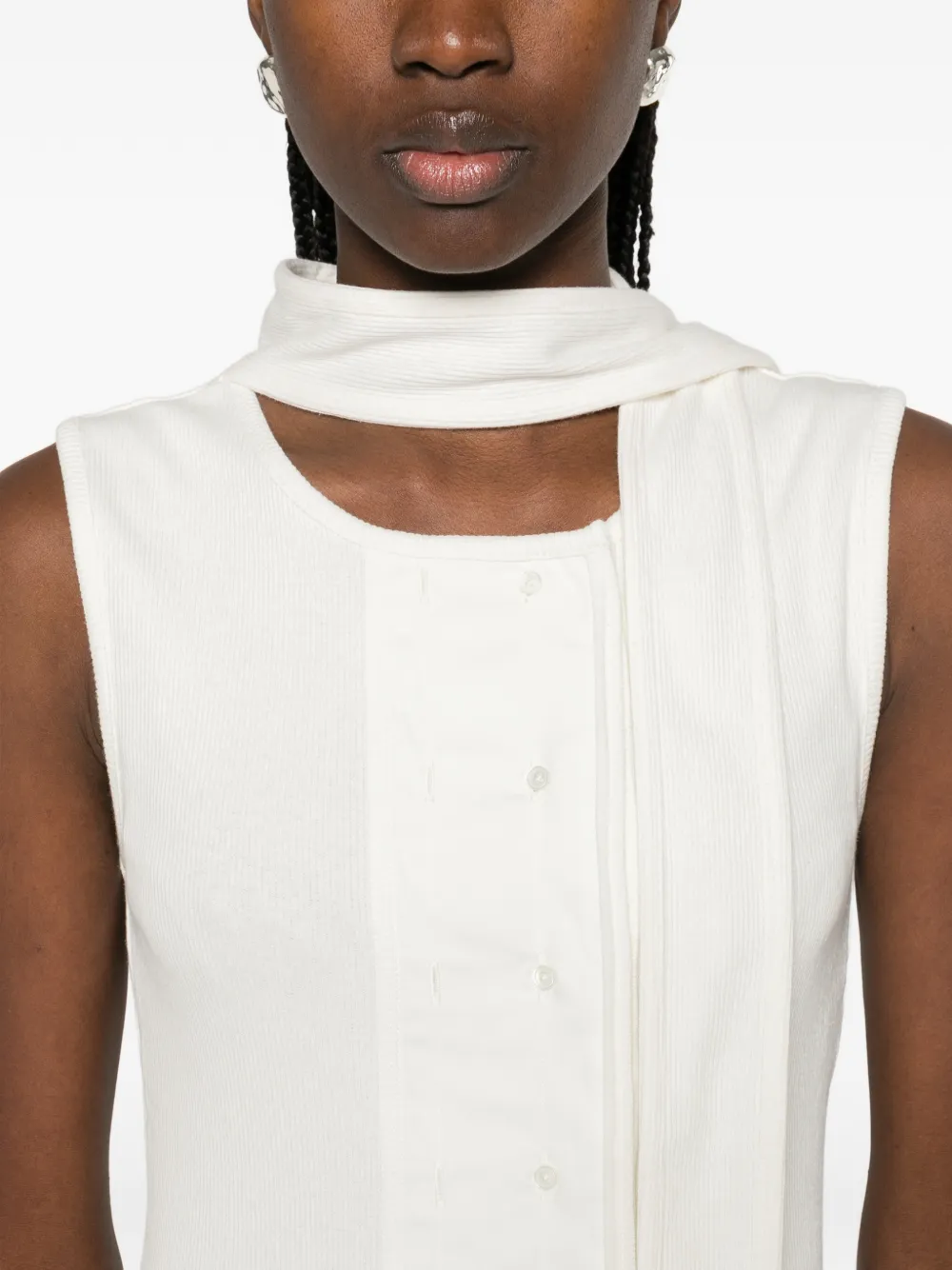 Close up of white top, showing texture of the cotton fabric