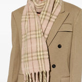 Pink scarf worn by a person, showing the scarf fit