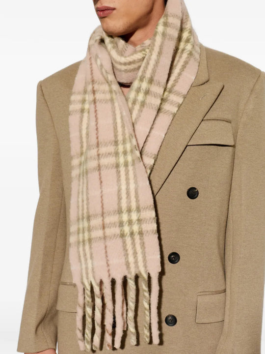 Pink scarf worn by a person, showing the scarf fit