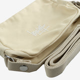 Close up of tan bag,showing texture of the cotton fabric