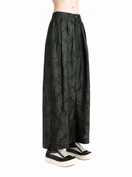Green pants worn by a person, showing the pants fit