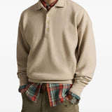 Tan top worn by a person, showing the top fit
