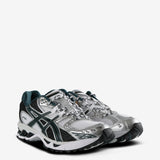 White running shoes,  front view