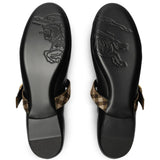 Black flats, back view