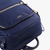 Close up of navy backpack, showing texture of the nylon fabric