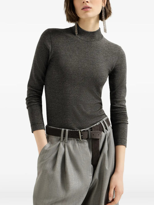 Grey knitwear worn by a person, showing the knitwear fit
