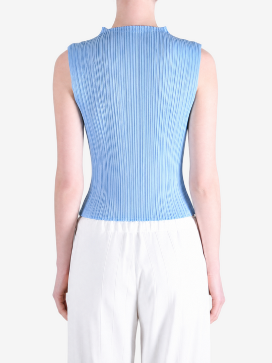Blue shirt worn by a person, showing the shirt fit