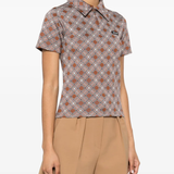 Brown shirt worn by a person, showing the shirt's fit