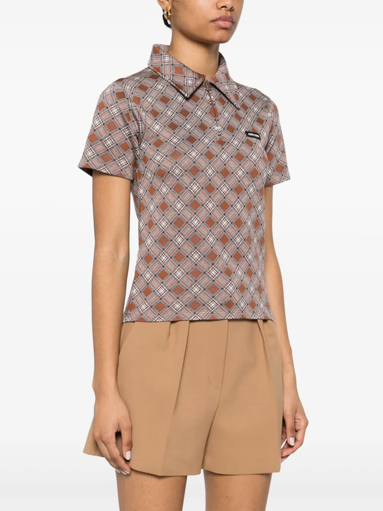 Brown shirt worn by a person, showing the shirt's fit