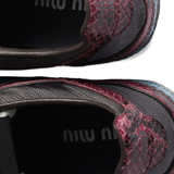 Close up of black sneaker,showing texture of the polyamide fabric