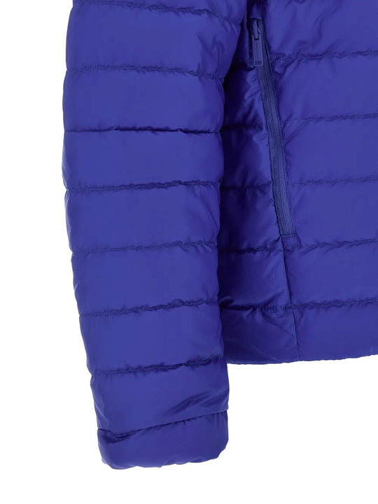 Close up of Blue hoodie, showing texture of the 100% polyamide fabric
