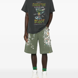 Green shorts, full body view