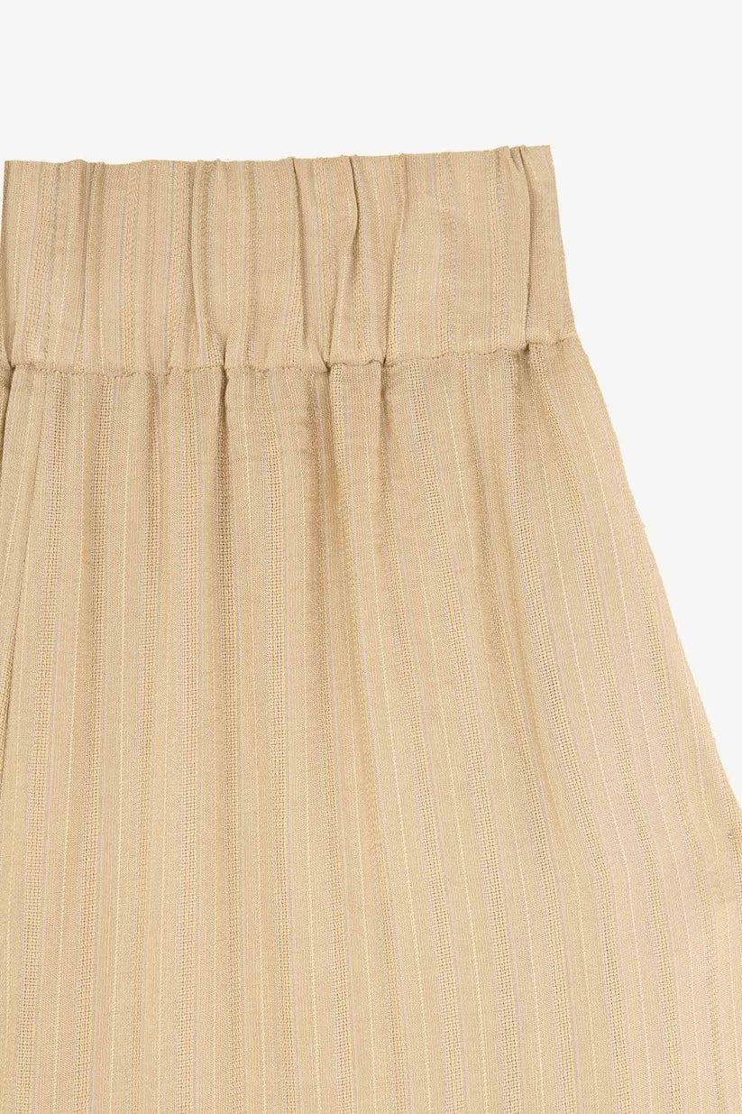 Close up of tan pants,showing texture of the viscose fabric