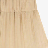 Close up of tan pants,showing texture of the viscose fabric