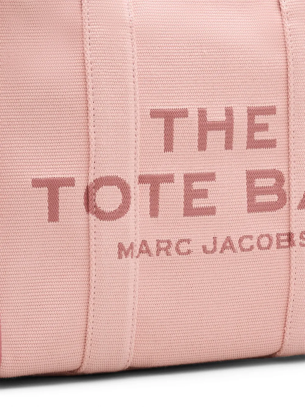 Close up of the pink bag, showing texture of the cotton fabric