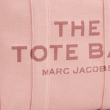 Close up of the pink bag, showing texture of the cotton fabric