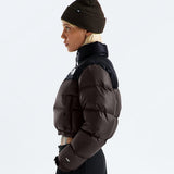 Brown jacket worn by a person, showing the jacket fit