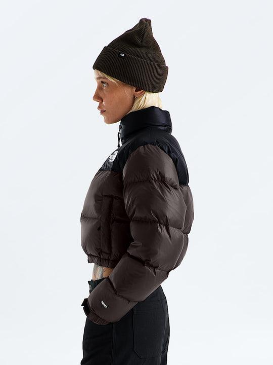 Brown jacket worn by a person, showing the jacket fit