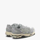 Grey sneakers, back view