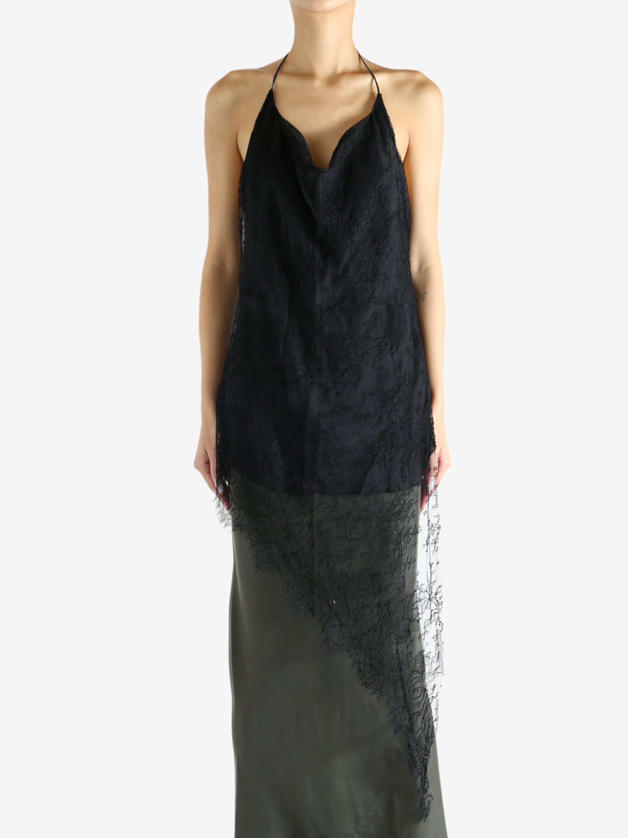 Black top worn by a person, showing the top's fit