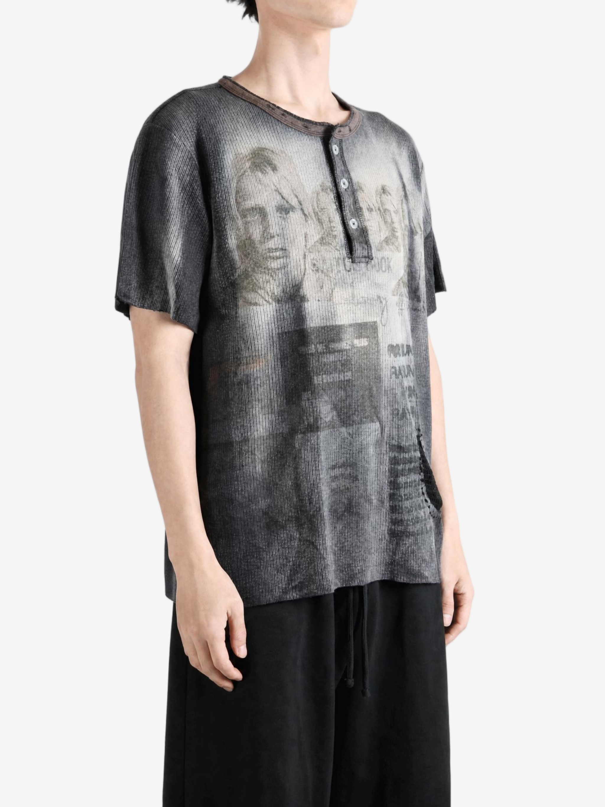 Grey t-shirt worn by a person, showing the t-shirt fit