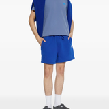 Black clog shoe worn by a person, showing the shoes fit