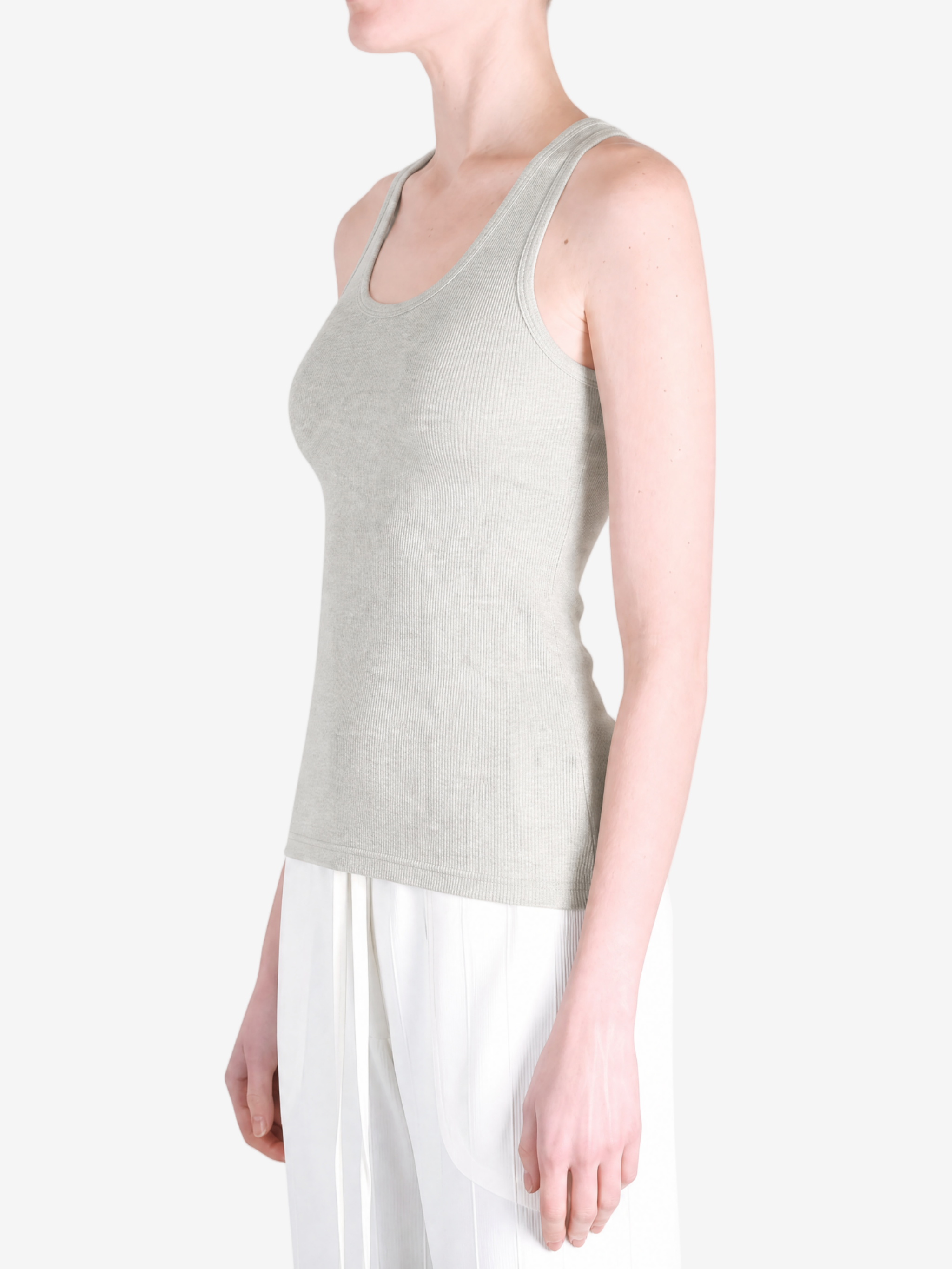 Tan top worn by a person, showing the top fit