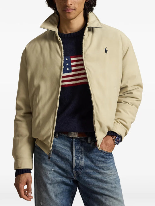 Tan jacket worn by a person, showing the jacket fit