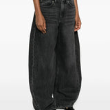 Grey jeans worn by a person, showing the jeans fit