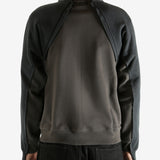 Brown jacket worn by a person, showing the jacket's fit