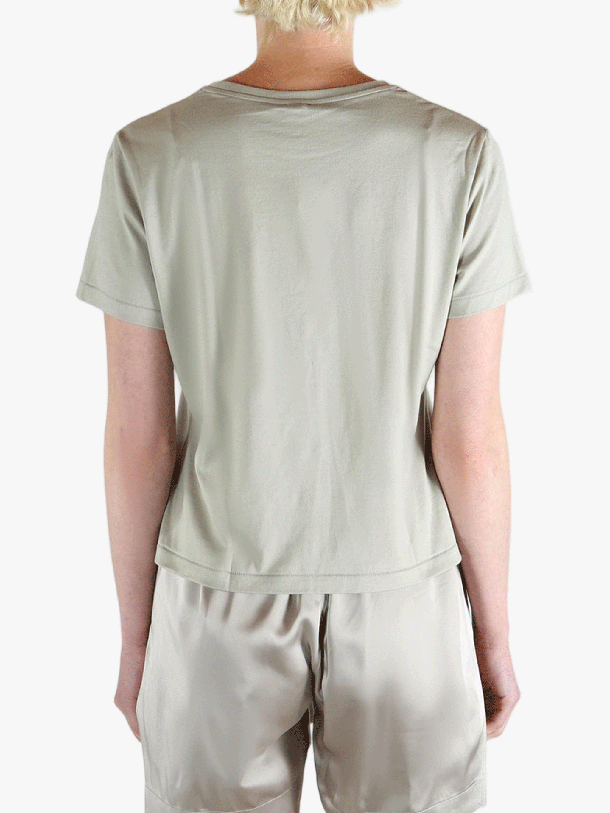 Grey t-shirt worn by a person, showing the shirt's fit