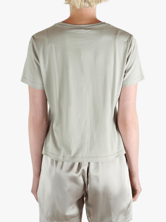 Grey t-shirt worn by a person, showing the shirt's fit