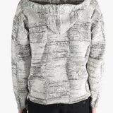 White coats worn by a person, showing the coats fit