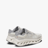 Grey sneakers, side view