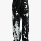 Black pants worn by a person, showing the pants' fit